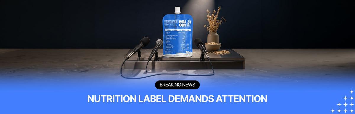 MYOM Original Oat Blend pouch showing its nutrition label at a mock press conference, with the headline “Breaking news: Nutrition label demands attention”.