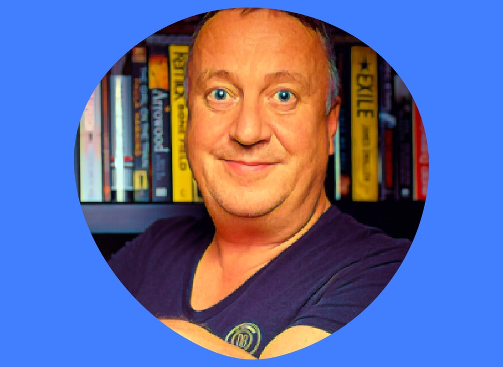 Photo of Mike Curtis on a blue background
