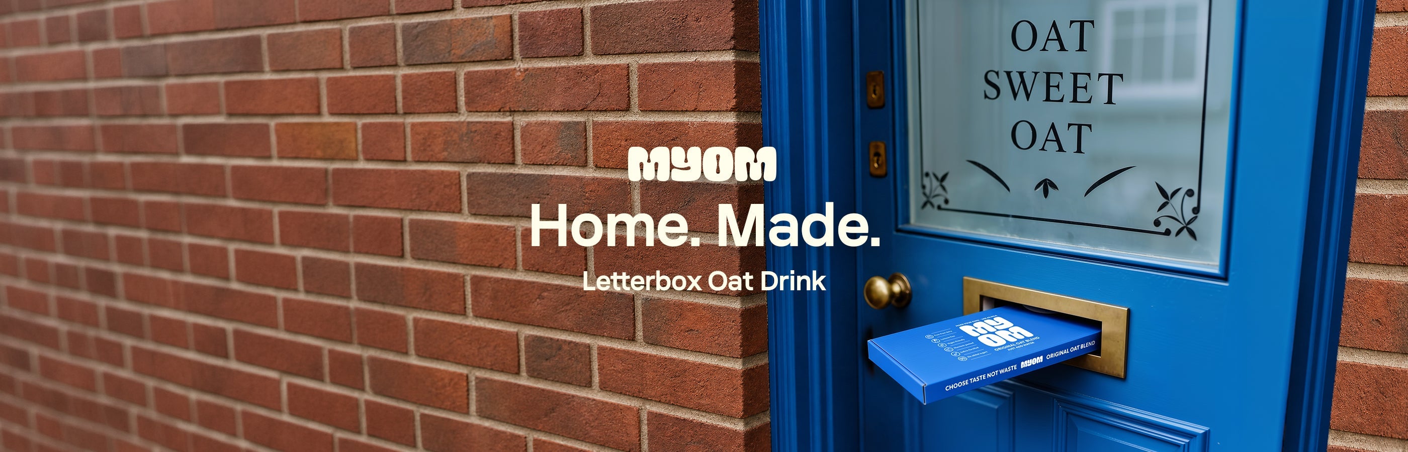  MYOM Original Oat Anywhere 6 Pack posting through a blue front-door letterbox — Home. Made. Letterbox Oat Drink