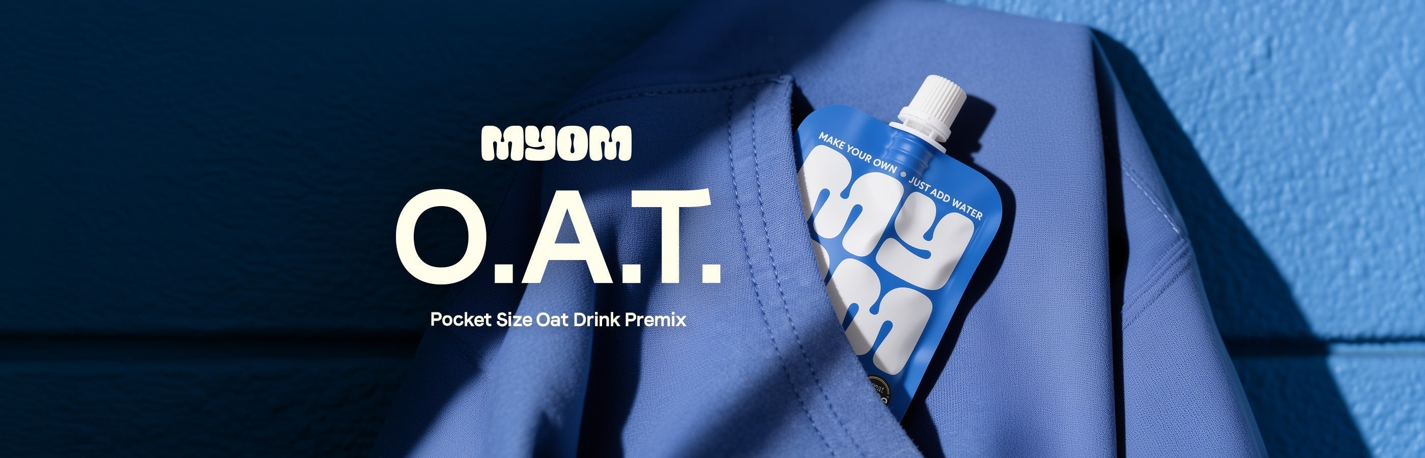 MYOM Anywhere oat drink premix pouch tucked into a pocket — O.A.T. Goes Where Cartons Can't