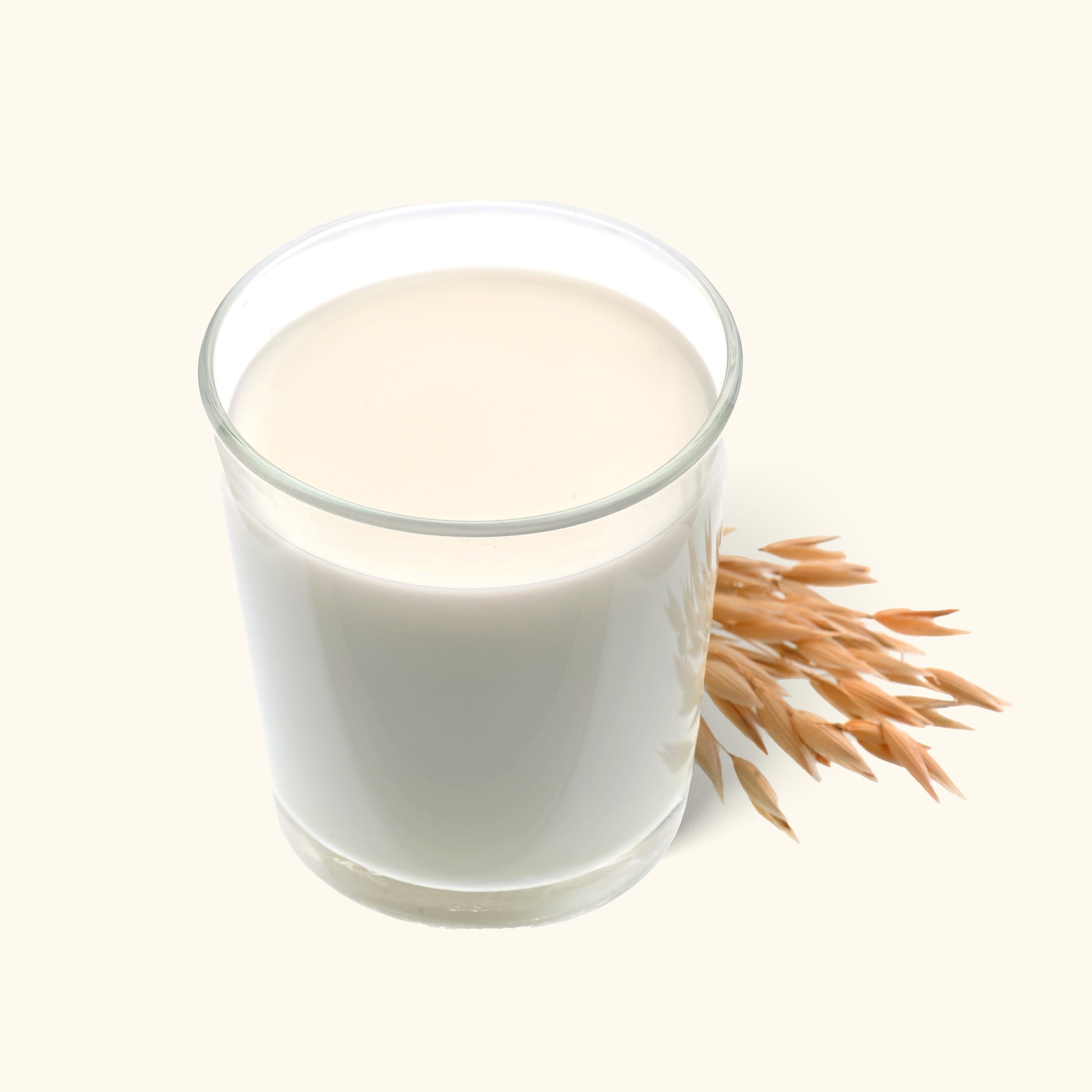 Photo of MYOM oat milk in a glass ready to drink