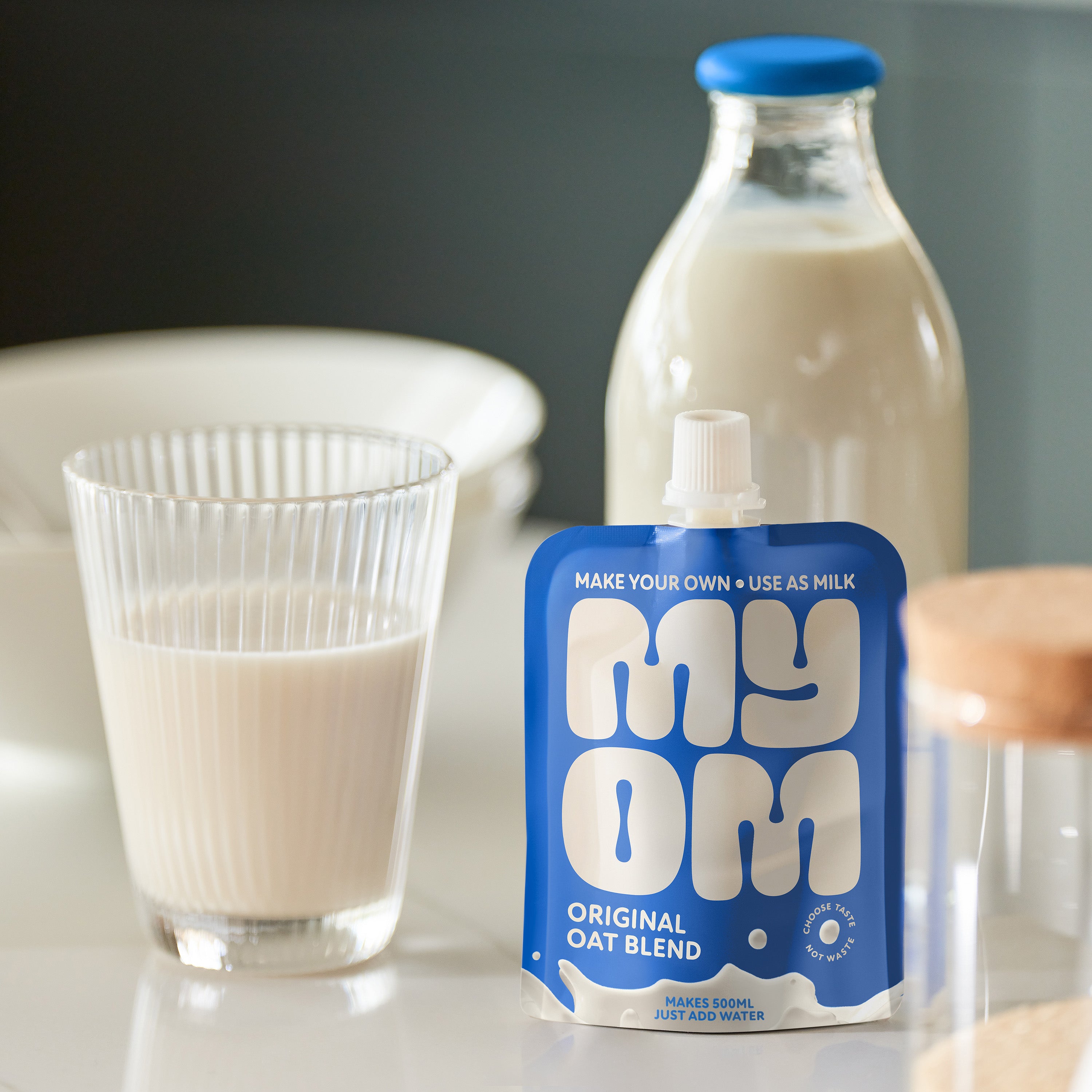 image showing myom oat milk mixed in a glass ready to drink