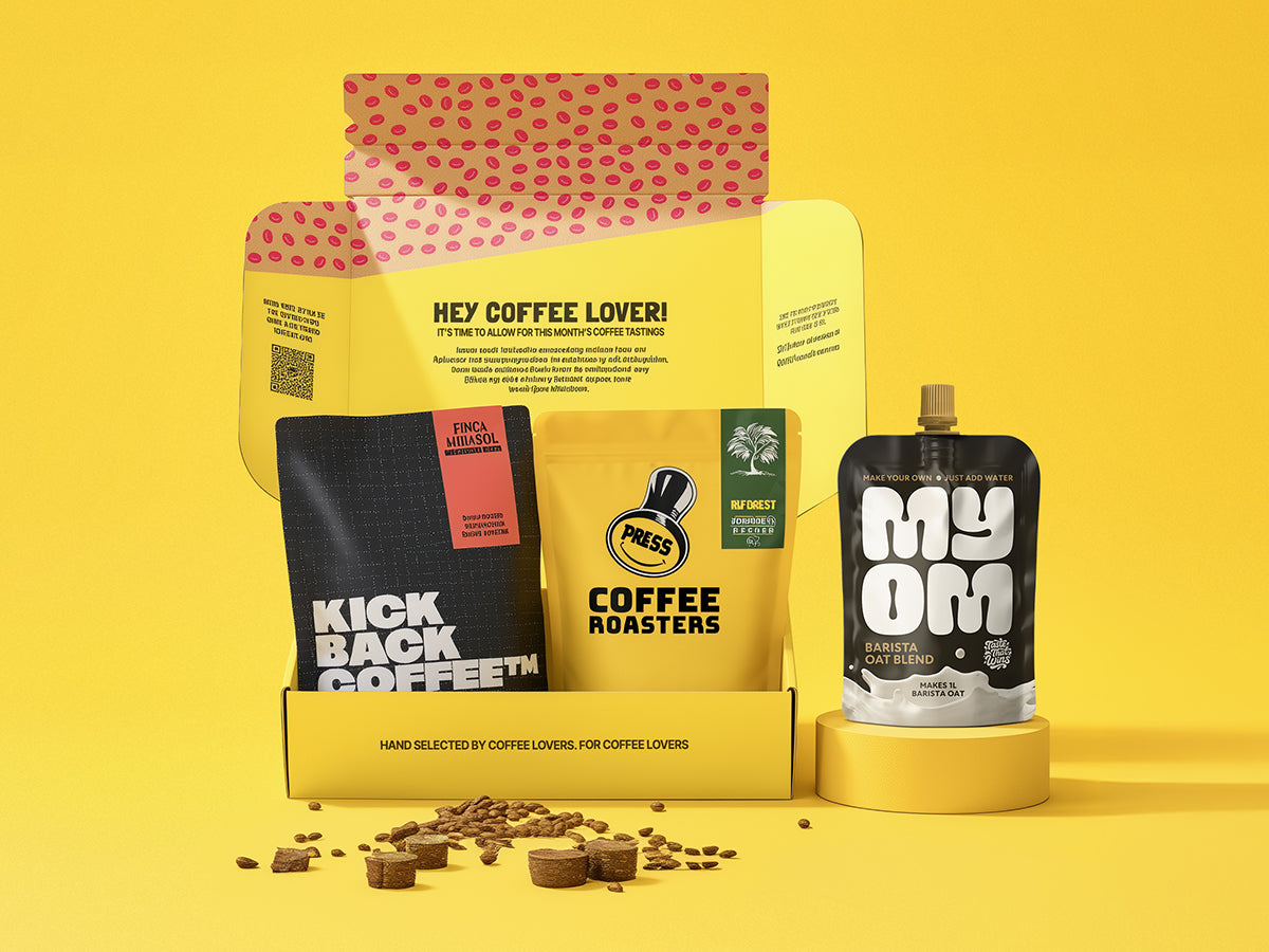 Open September RISE Coffee Box with two speciality coffee bags and a MYOM Barista Oat pouch included for sampling