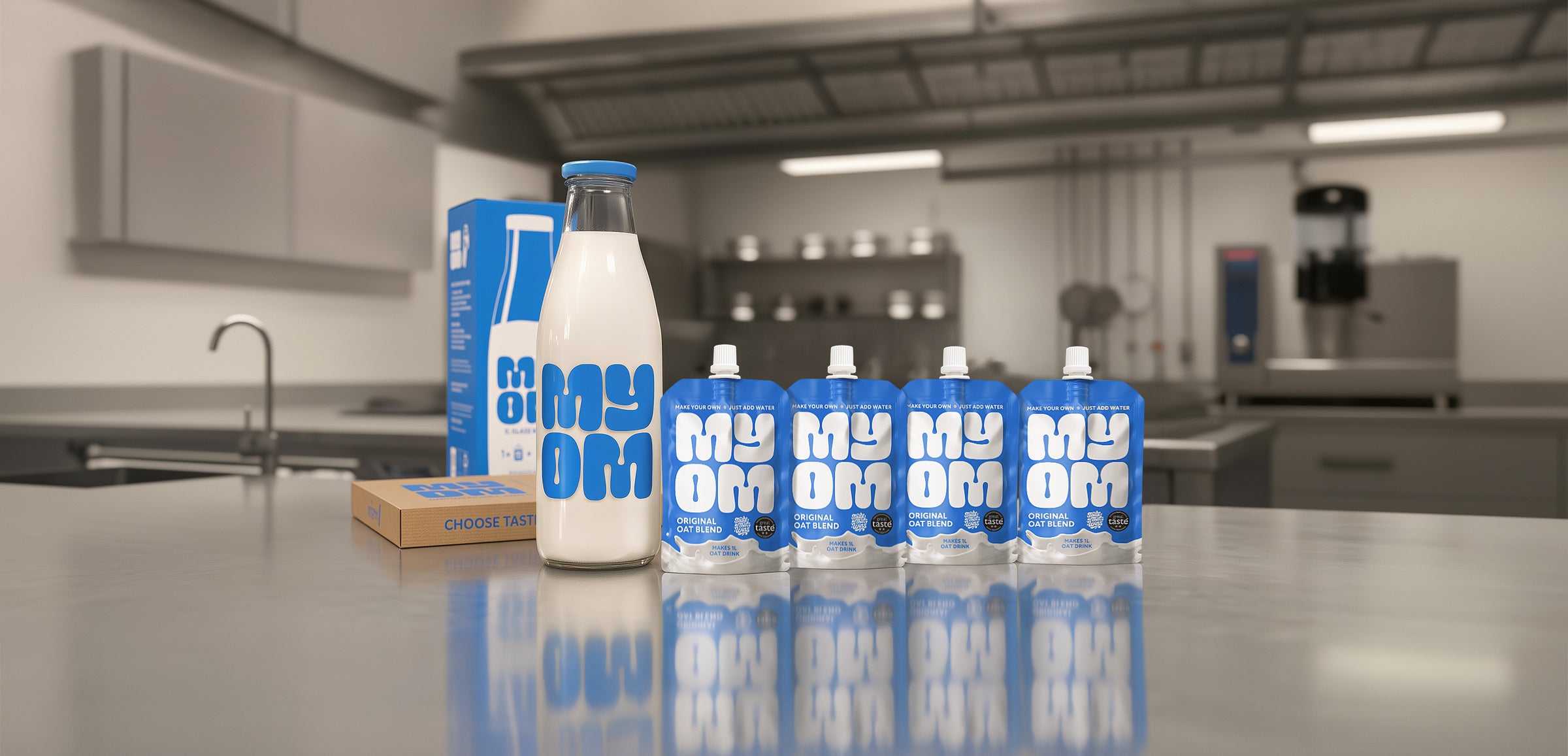 MYOM Original oat milk premix starter bundle: four pouches, a filled 1L glass bottle and postal box